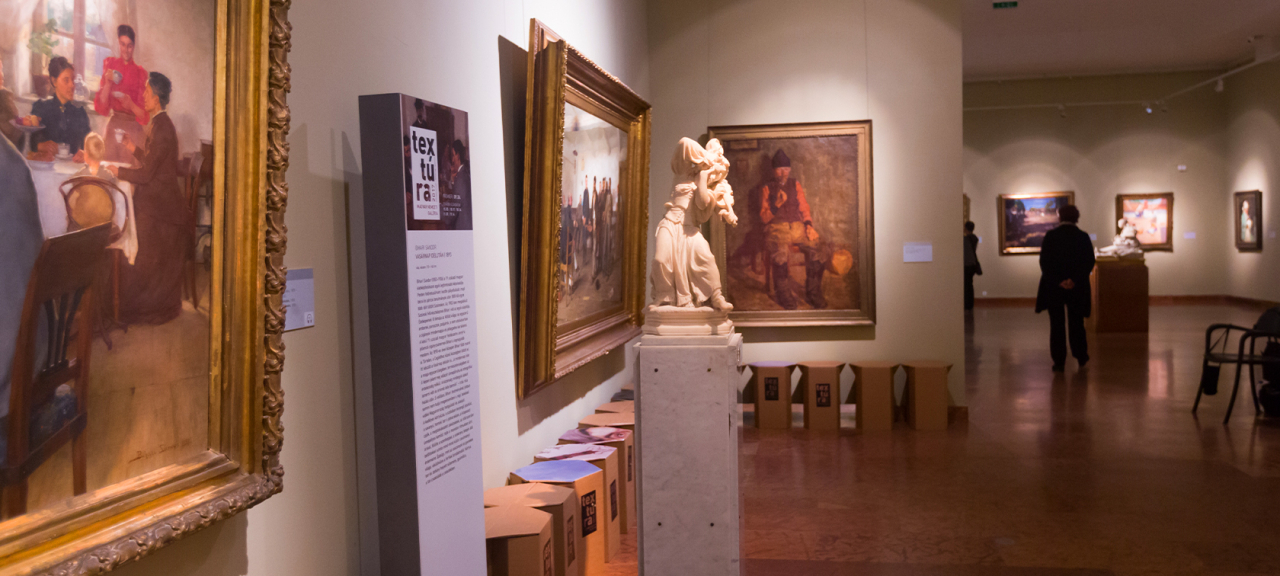 Paintings and objects in a museum.