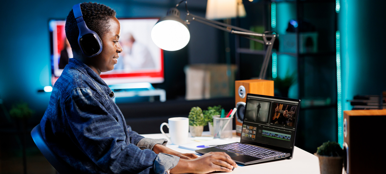 Woman working on audio files.