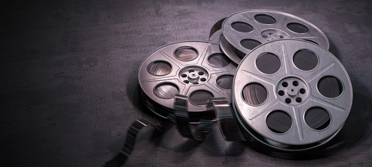 Film reels on table.
