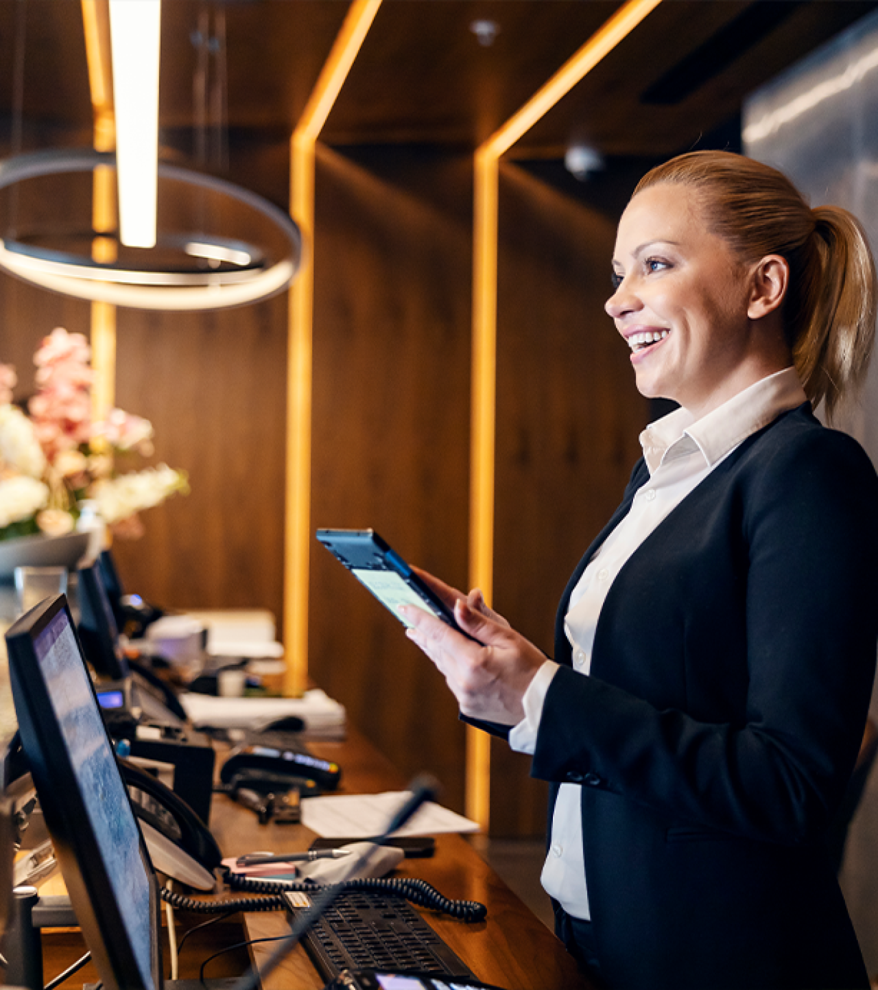 Femal hotel reception worker.