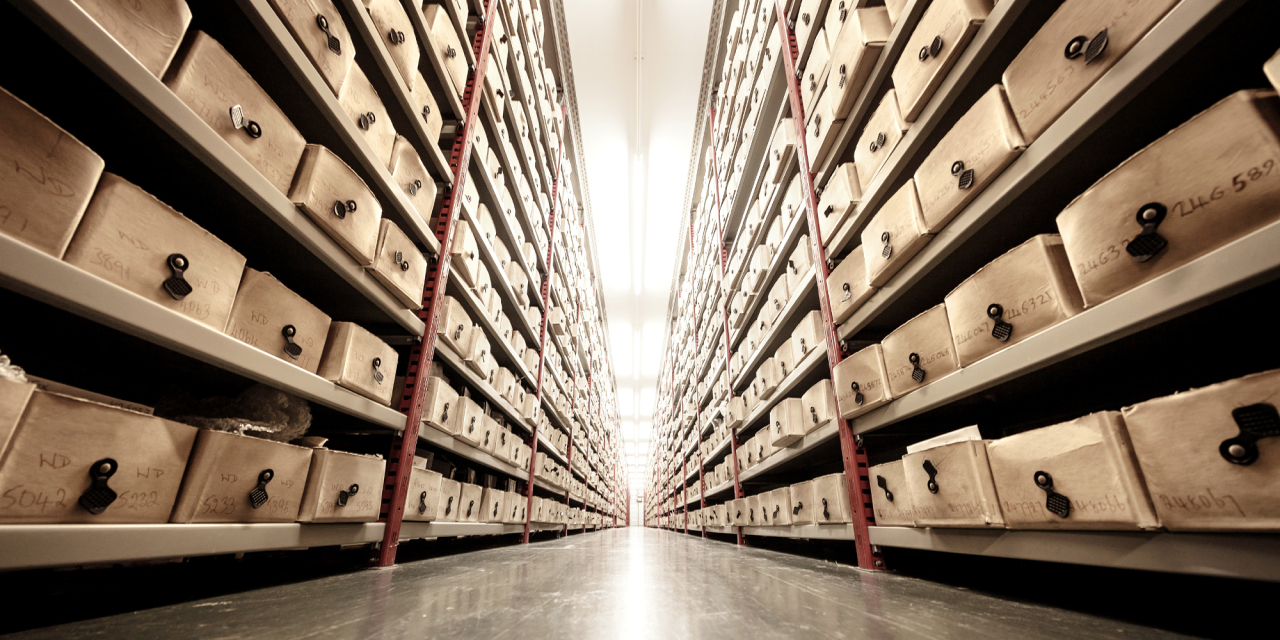 Floor view of shelves or archive boxes.