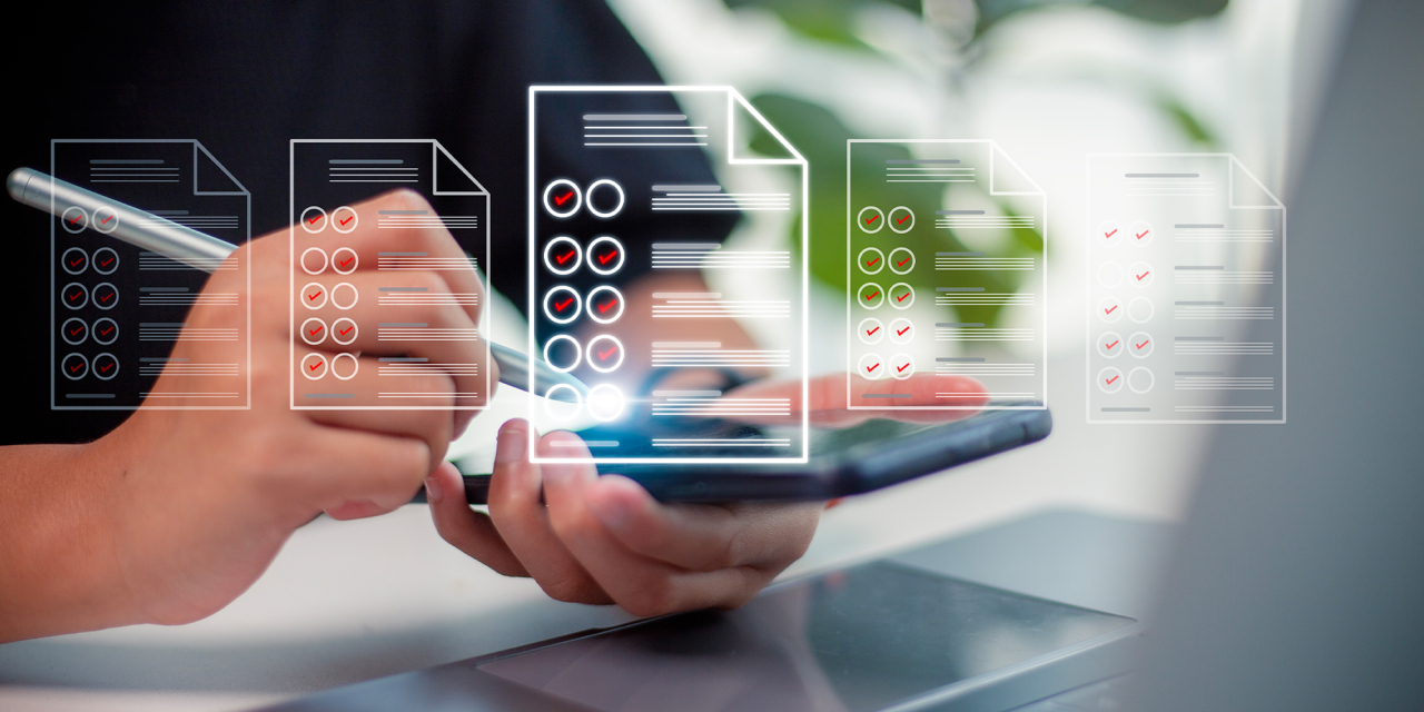 Person working on tablet with overlay of document icons.