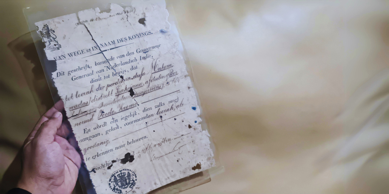 Old document in protective covering.