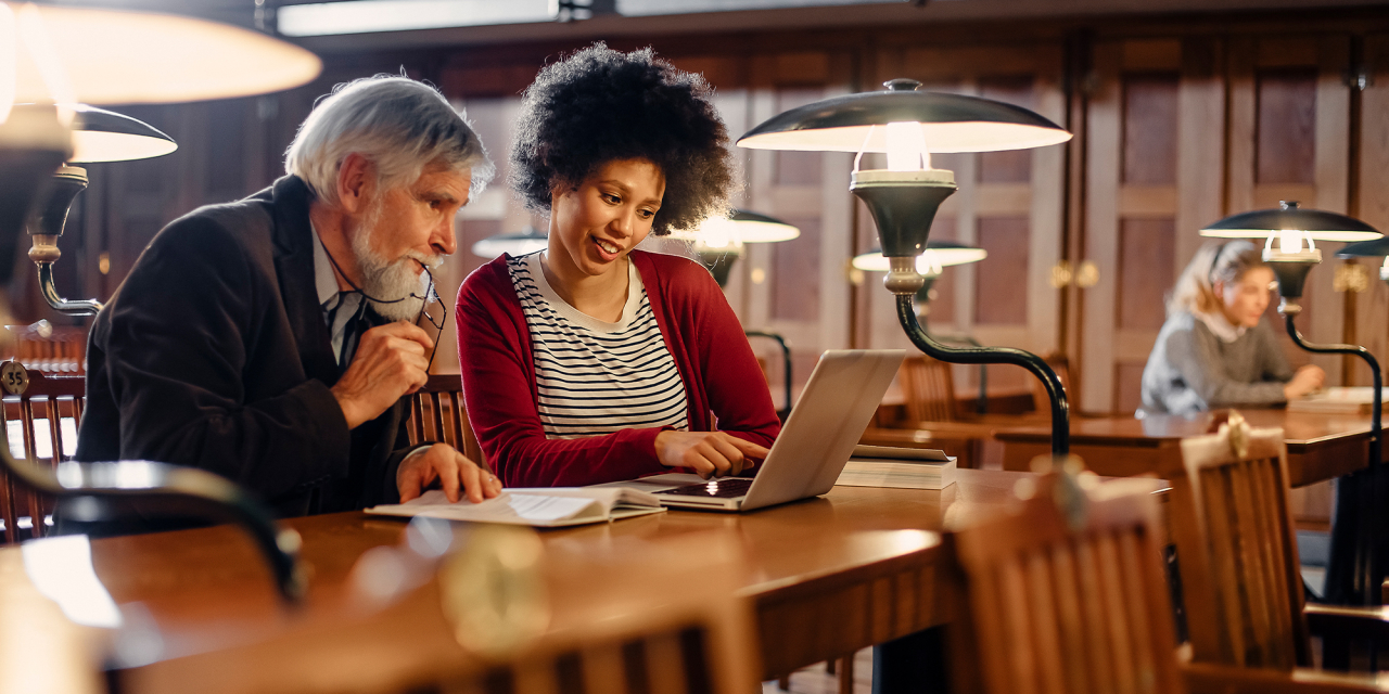 Two people discussing a project.