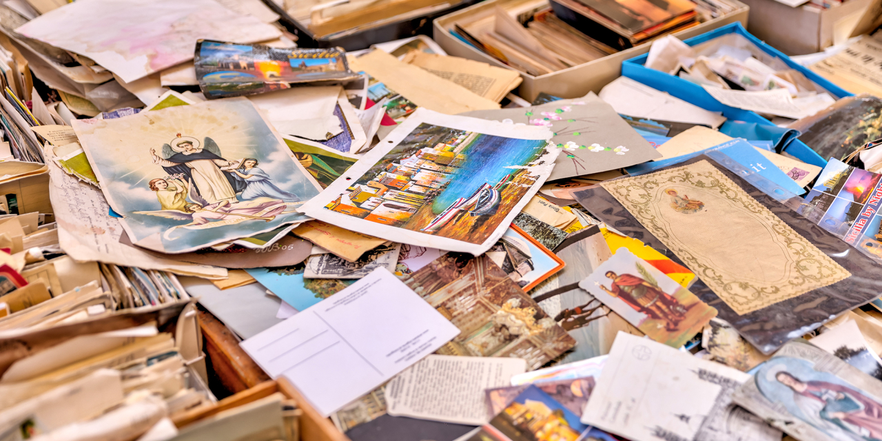 Piles of old postcards and boxes.