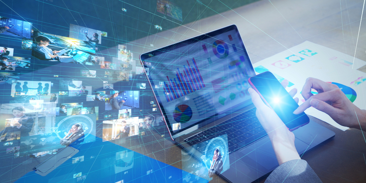 Phone and laptop with multim media file overlays.