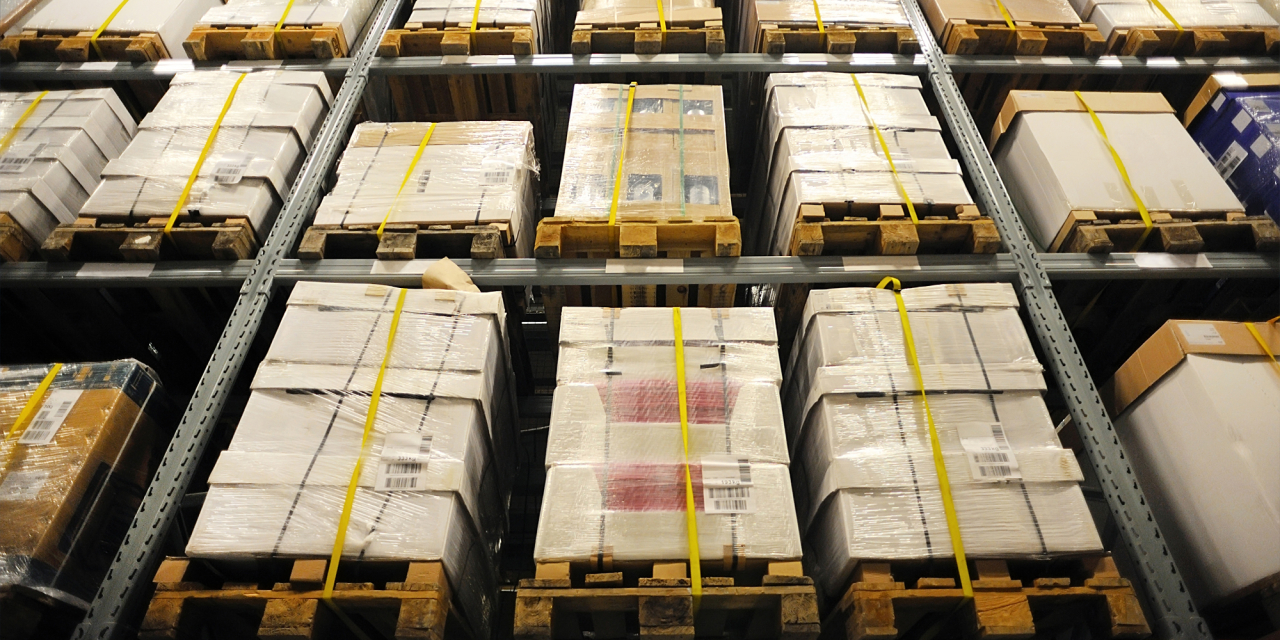 Files stored in boxes on pallets.