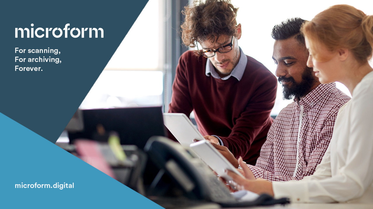 Microform Branding - Colleagues sharing views on tablet devices.